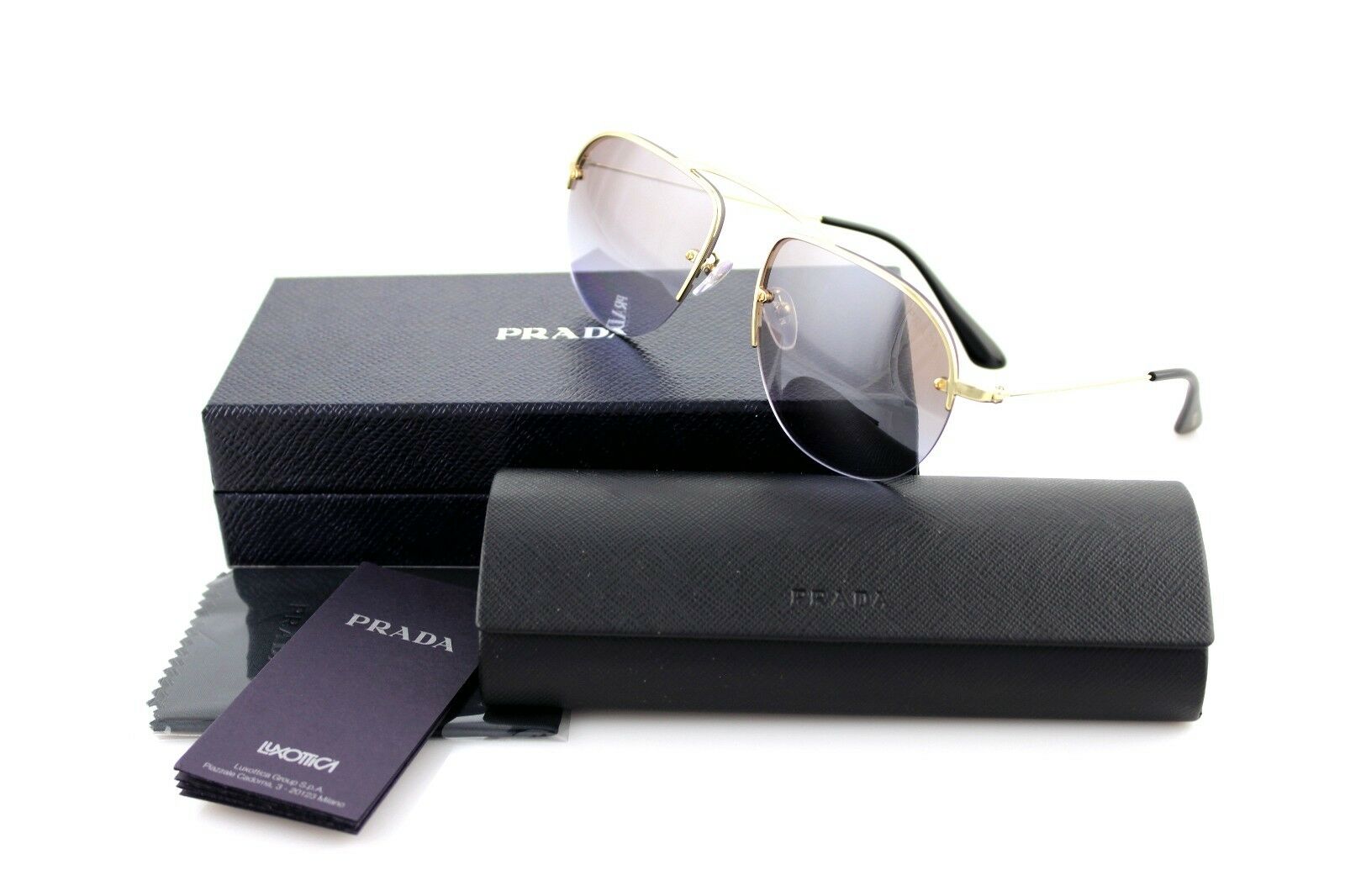 Prada Teddy Unisex Sunglasses SPR 58O ZVN 2H2 58OS 1
